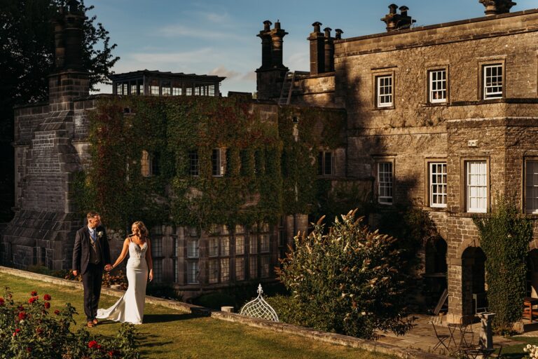 The hall floodlit at dusk, Tissington Hall