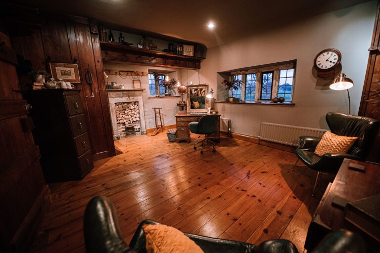 The wood-panelled Carriage House lounge, Tissington Hall