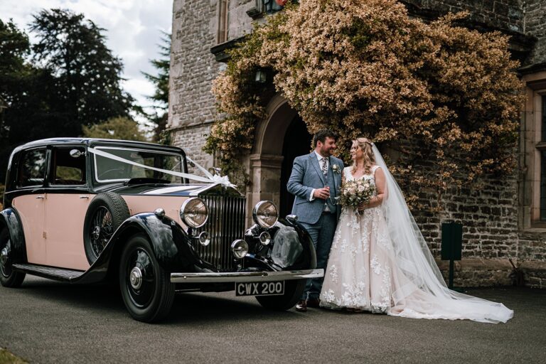 Vintage wedding car at the hall entrance, Tissington Hall
