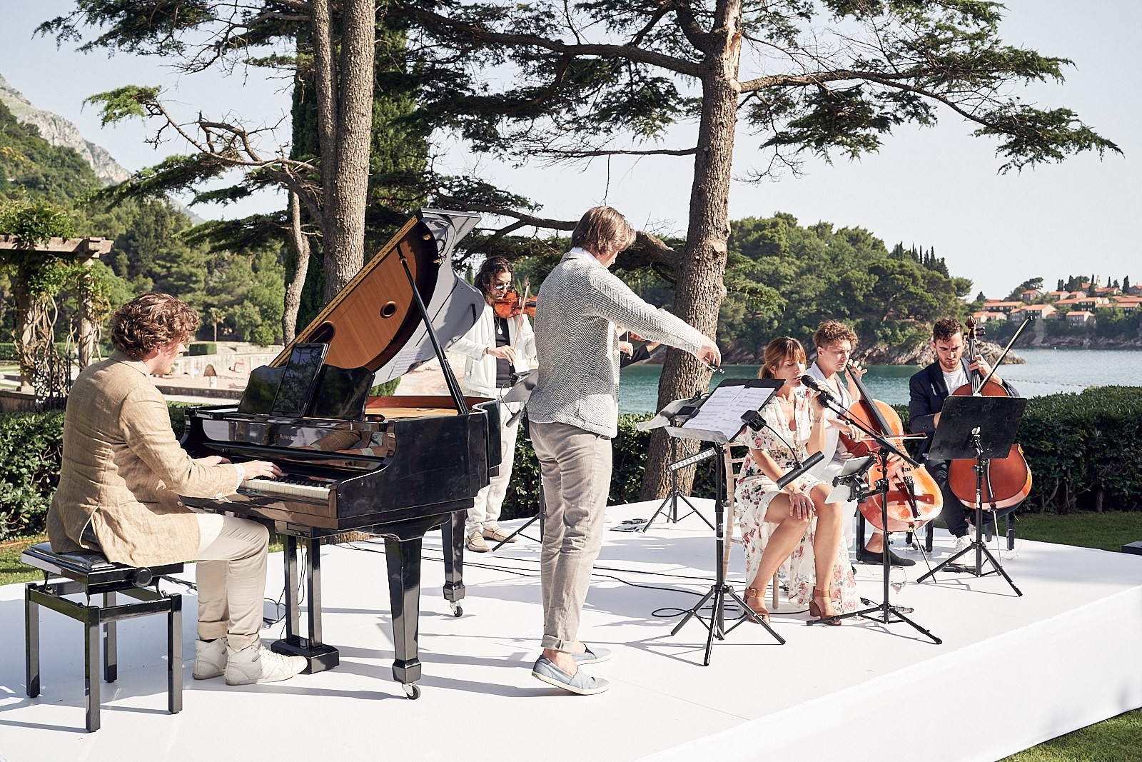 Extended ensemble with grand piano and strings alongside the duo, lakeside ceremony, Tobi Tobi
