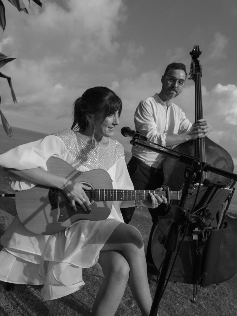 Black and white close frame of Renee and Jamie playing together, Tobi Tobi