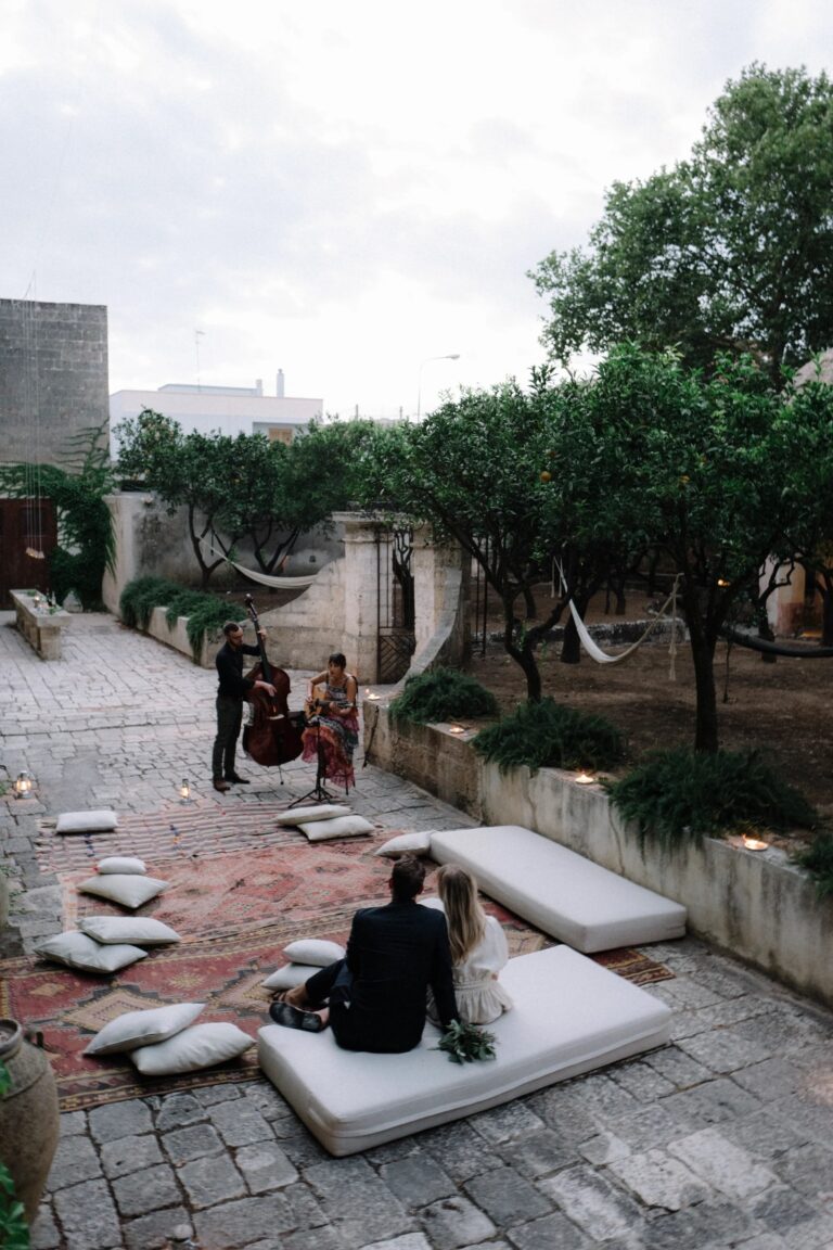 Duo playing in a Mediterranean courtyard garden, Tobi Tobi