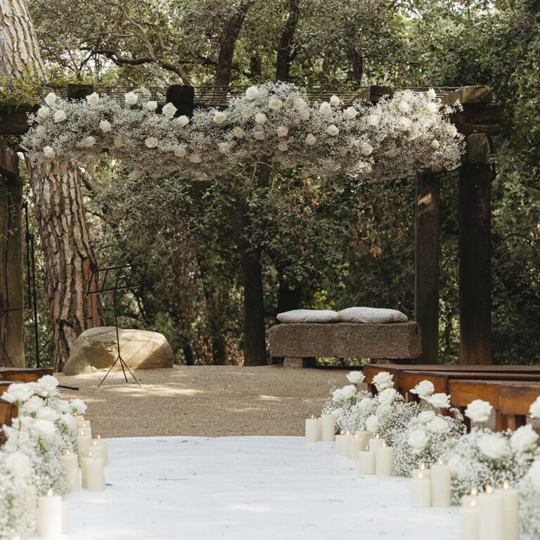 Woodland ceremony arch with floral crown, Torre Sever