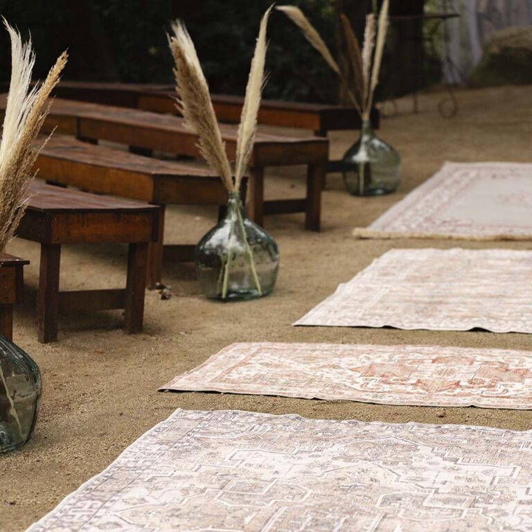 Wooden ceremony benches with rugs in the forest, Torre Sever