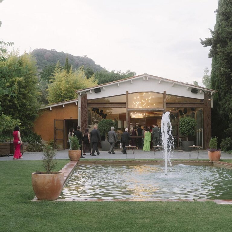 The reception hall seen across the fountain pool, Torre Sever