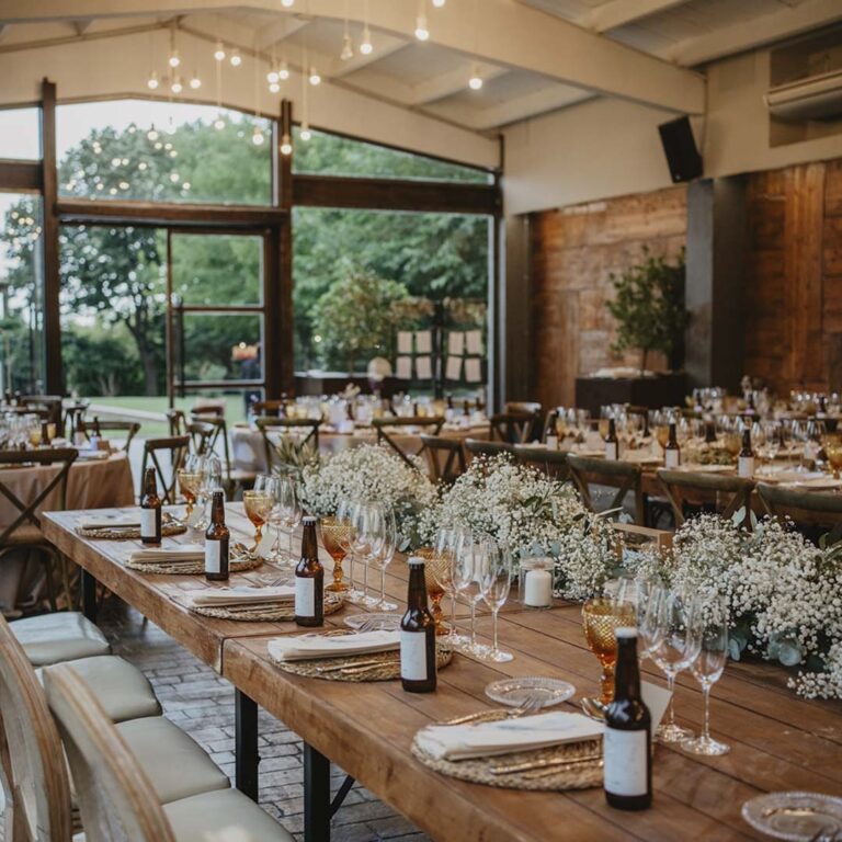 Banquet hall laid for dinner with garden views, Torre Sever