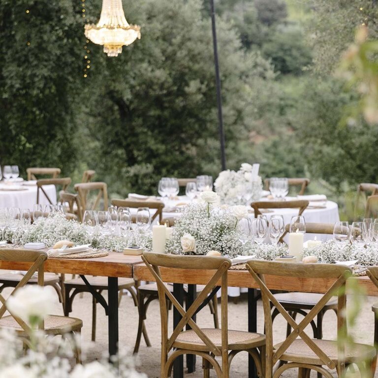 Outdoor table with chandelier and floral centrepieces, Torre Sever