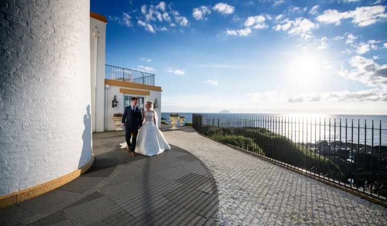 A couple on the Turnberry Lighthouse terrace, Trump Turnberry