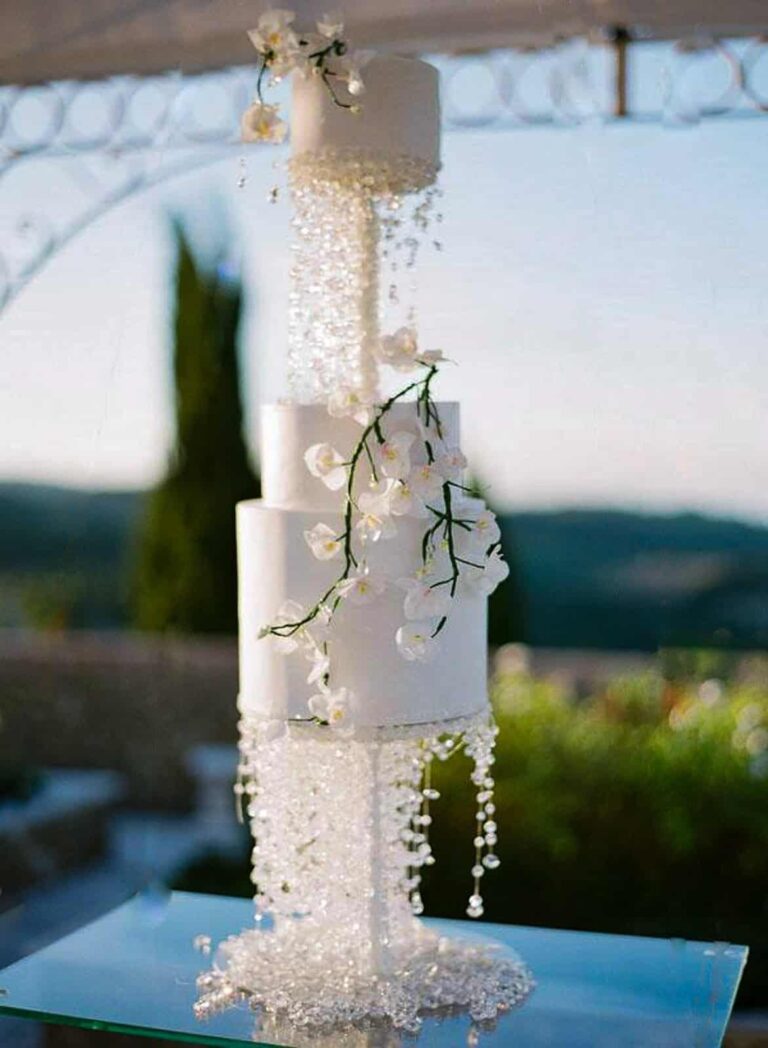 Luxury wedding cake with cascading Swarovski crystals and white sugar orchids at a villa in Tuscany, Italy., Tuscan Wedding Cakes