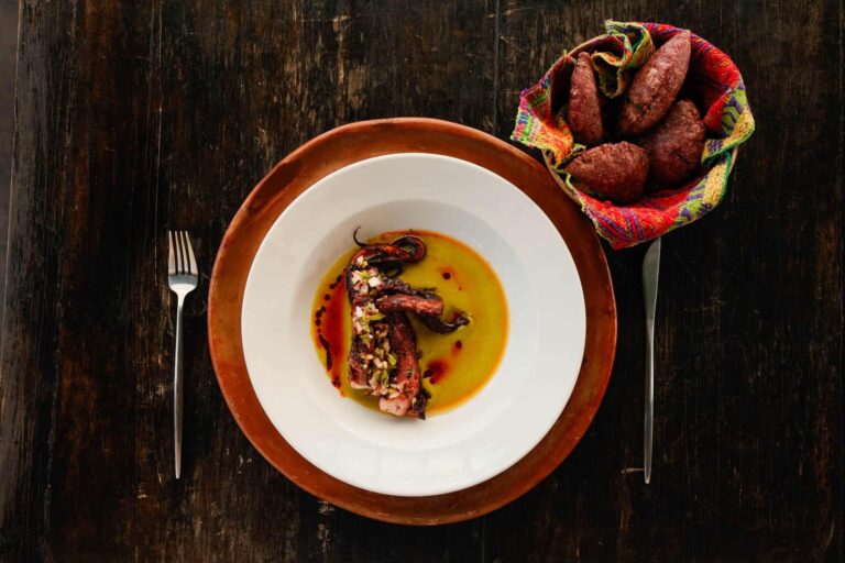 Plated main course with sweet potato fritters, Umaya Resort and Adventures