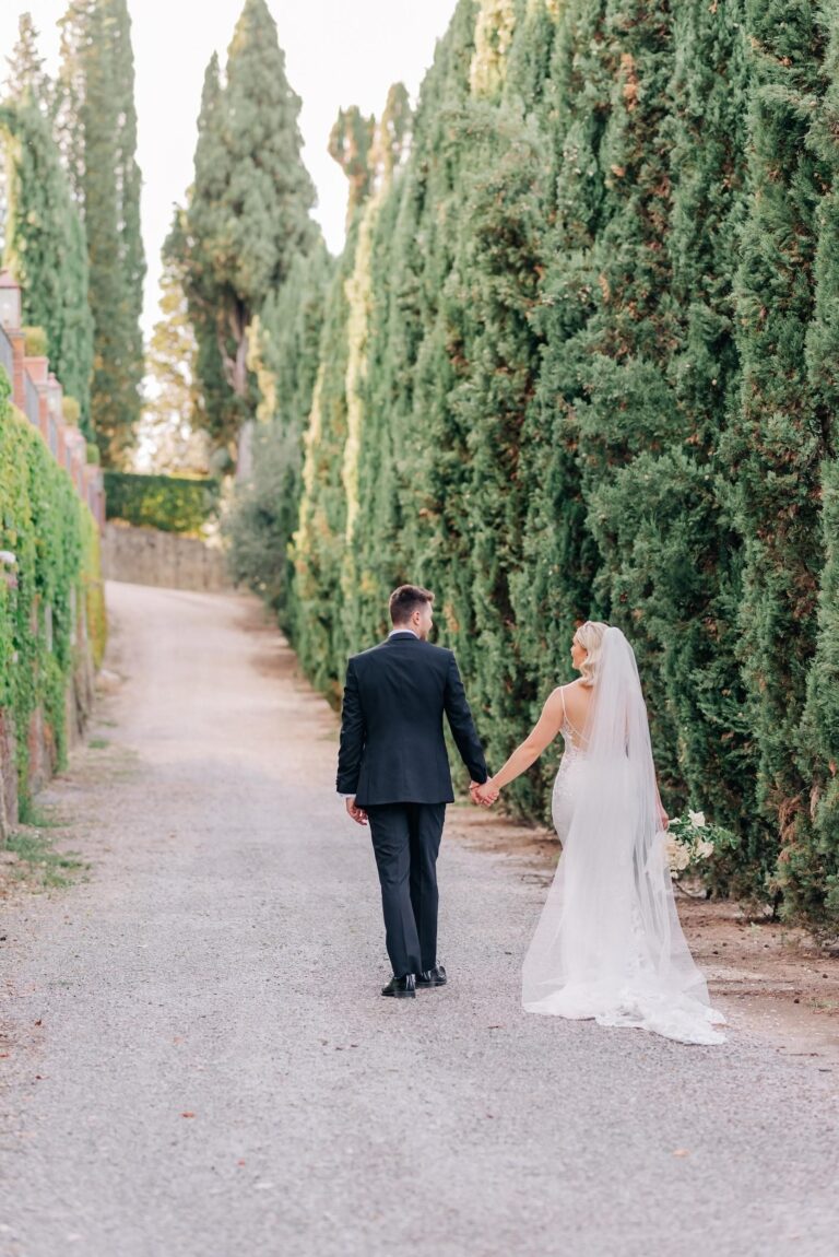 Walking away down an avenue of cypresses, Umbria Weddings and Events