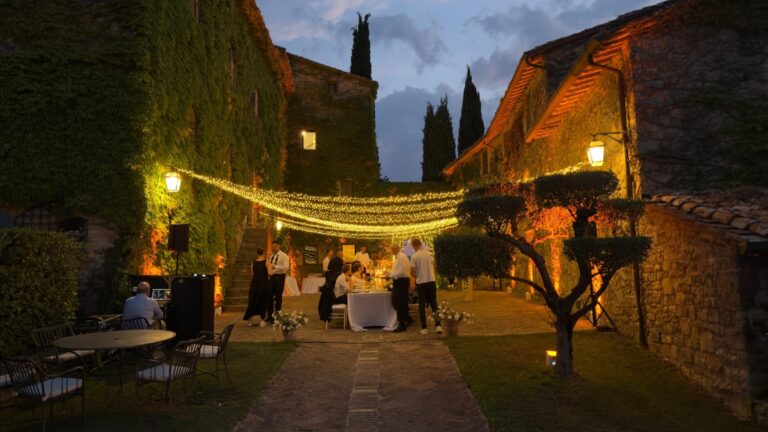 UMX Crew: Festoon lighting over a garden courtyard