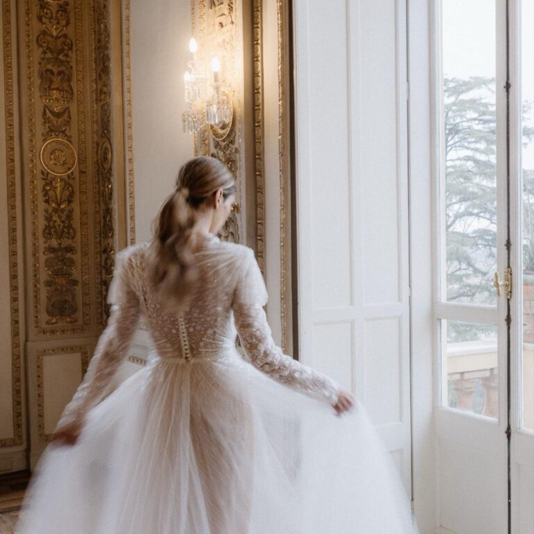 UMX Crew: A bride in a palazzo window