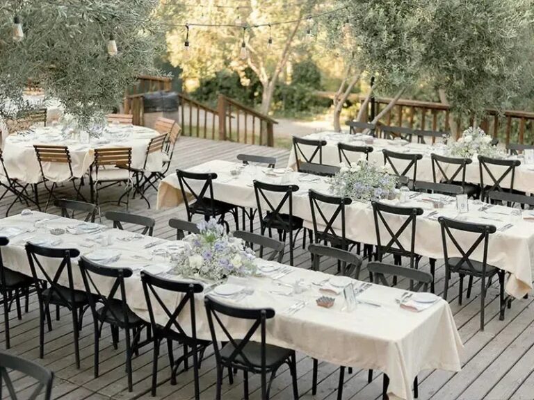 Long tables set on the wooden deck among the olives, Urla Sahne