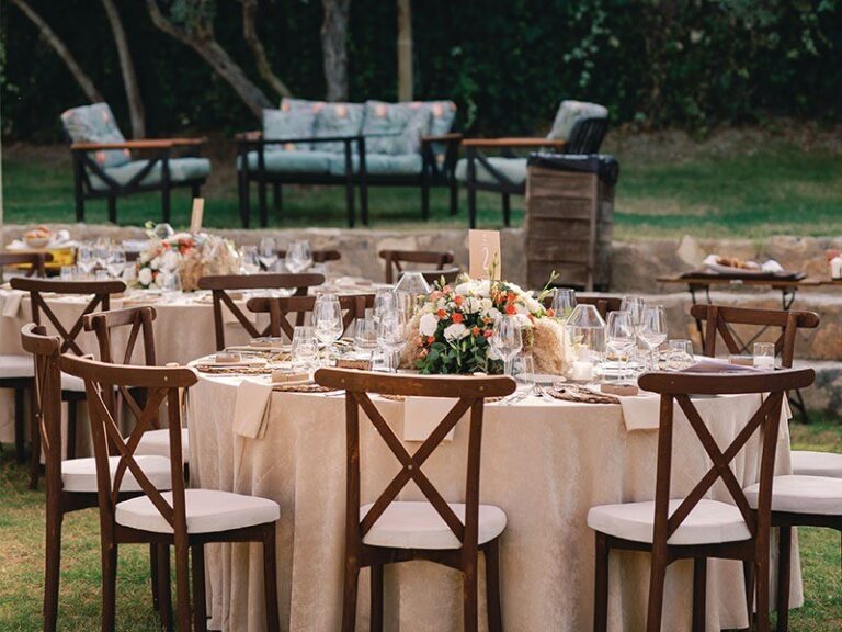 Round tables laid for a dinner in the garden, Urla Sahne
