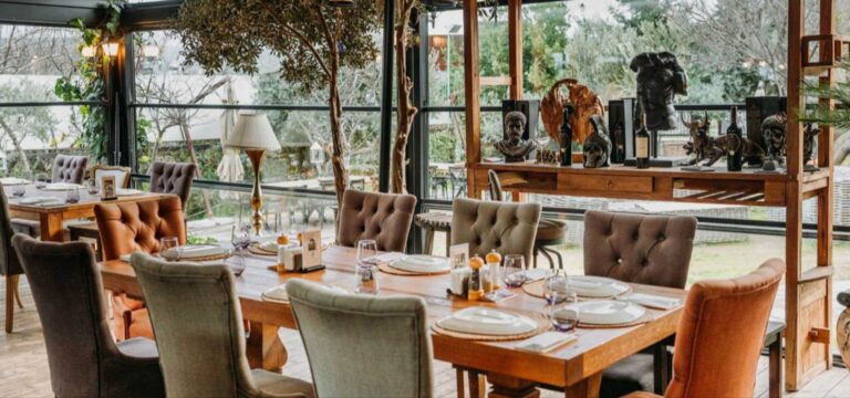 The glass-walled dining room of The Guru, Urla Sahne