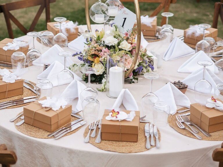 A round table laid with linen and glassware, Urla Sahne