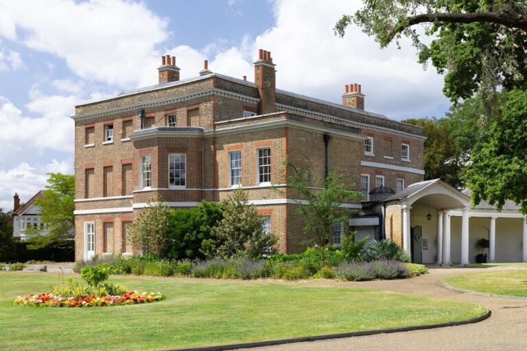 The mansion across the formal bedding of the front garden, Valentines Mansion & Gardens
