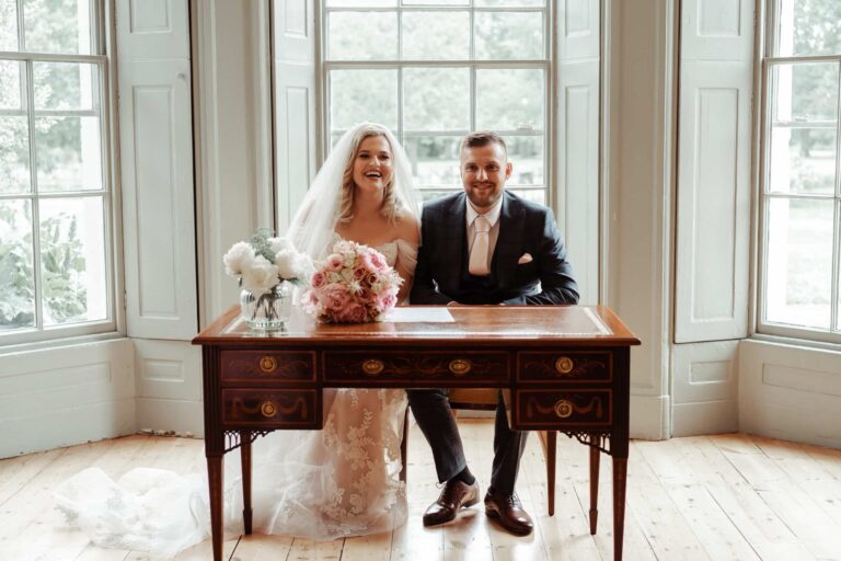 Signing the register at the desk between the windows, Valentines Mansion & Gardens
