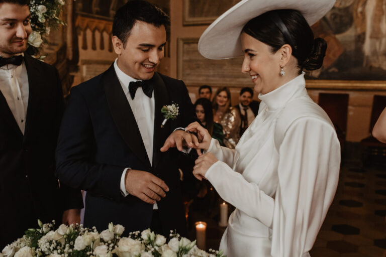 Ring exchange during a ceremony in Rome, Vera Weddings
