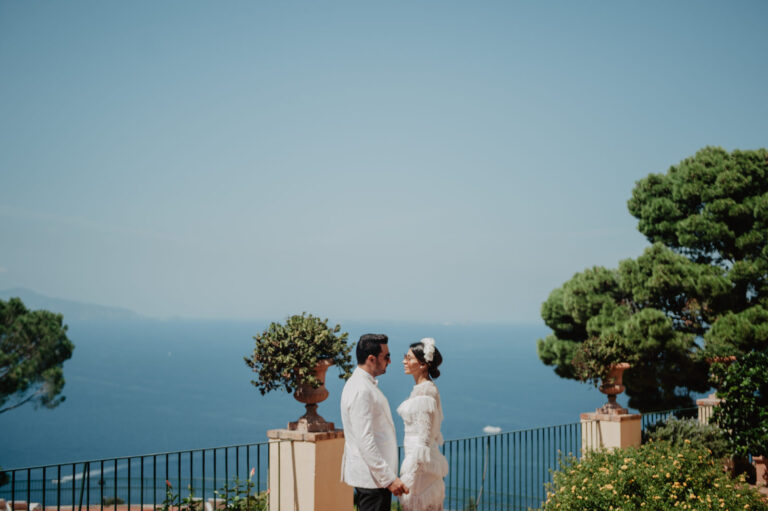 Couple on a Capri terrace overlooking the sea, Vera Weddings