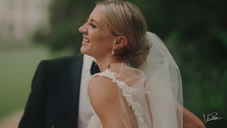 A bride laughing beside her groom at Château Challain-la-Potherie, France, Vic Rivero Films
