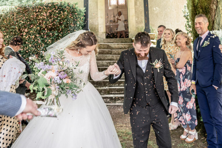 Confetti on the chapel steps after the ceremony, Chateau de Bouthonvilliers, France, Victoria Amrose Photography