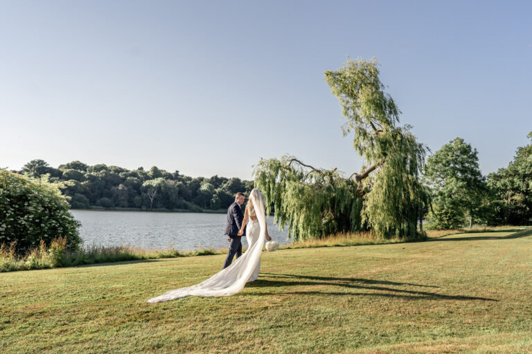 The couple beside the lake at Combermere Abbey, Shropshire, Victoria Amrose Photography