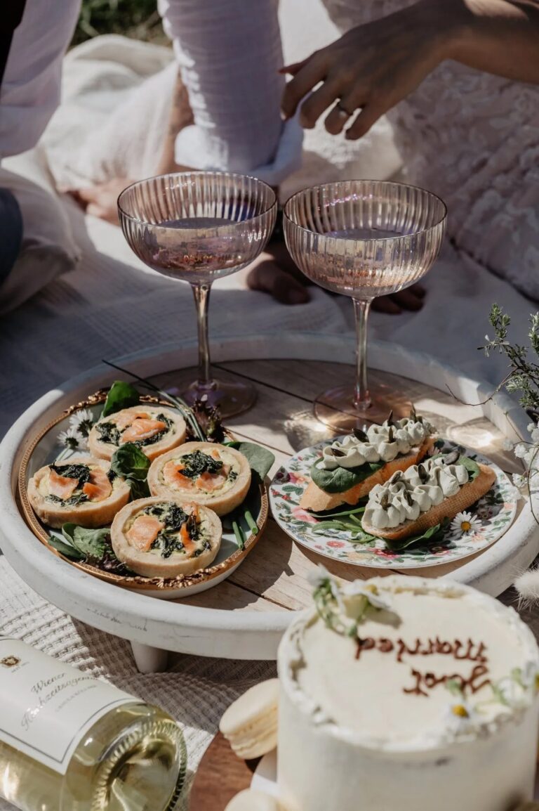Savoury tarts, coupes and a just married cake on a picnic tray, Vienna Picnics