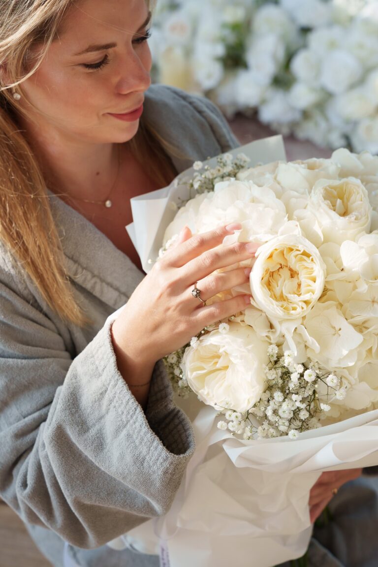 Bride-to-be holding a bouquet of white peonies and roses, Vienna Picnics