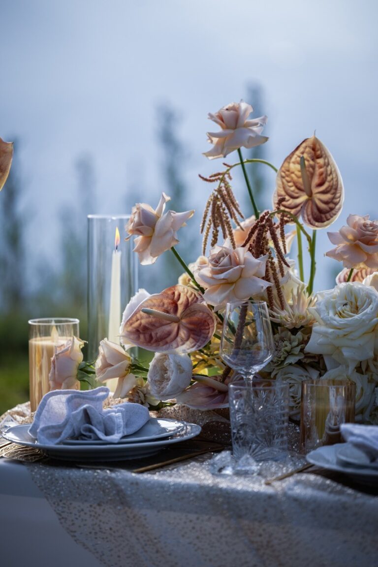Anthurium and rose arrangement on a mountain picnic table, Vienna Picnics