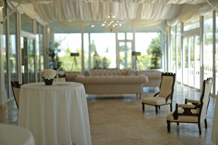 The glass-walled marquee set with a lounge area, Villa Arrigo