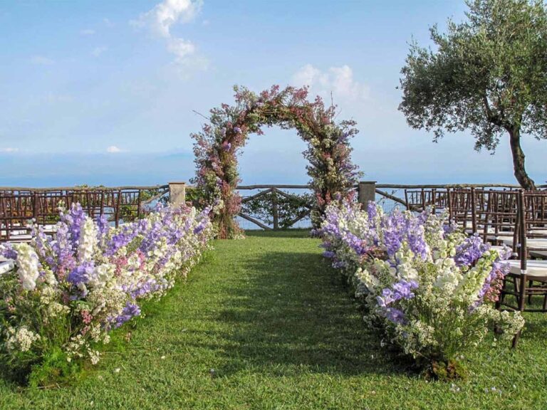 Flowered arch and aisle on the lawn above the sea, Villa Cimbrone