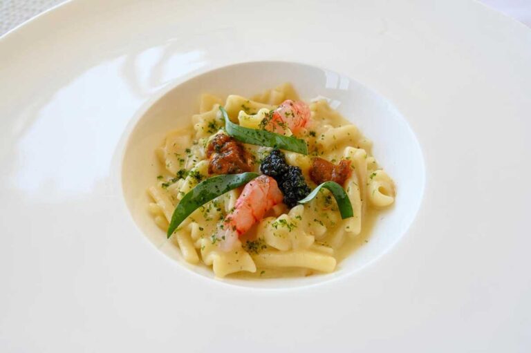 Pasta with seafood on a white plate, Villa Cimbrone