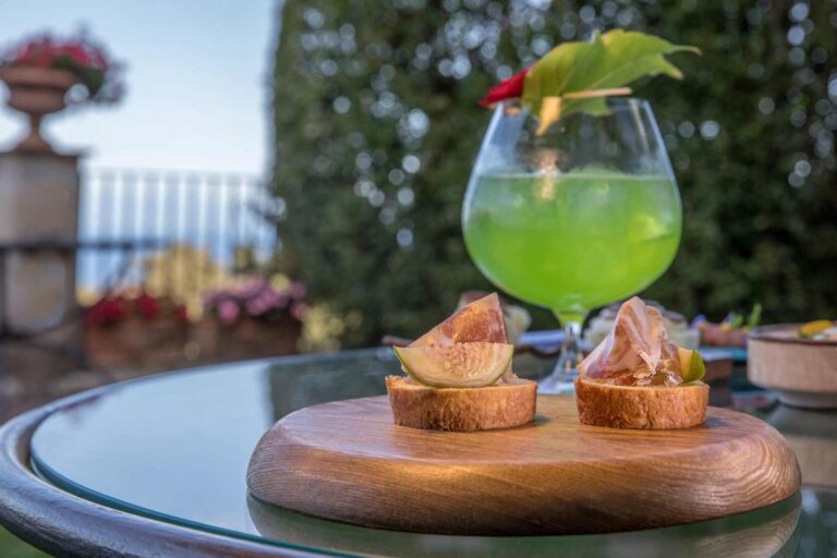 A green cocktail and canapes on the terrace, Villa Cimbrone