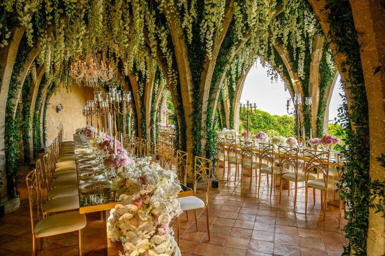 Long banquet table under a canopy of wisteria, Villa Cimbrone