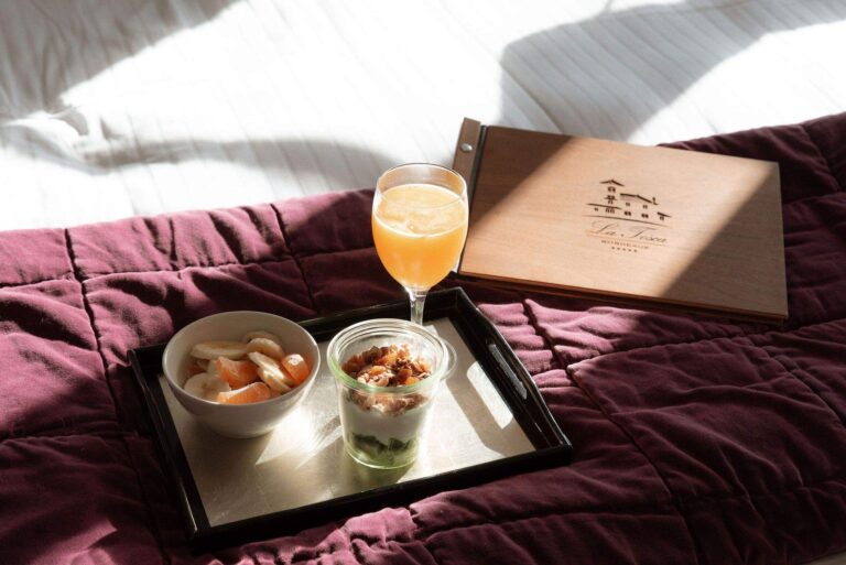 A breakfast tray with a fruit pot and juice, Villa la Tosca