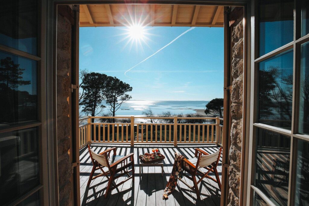 Balcony terrace seen through open doors, Villa la Tosca