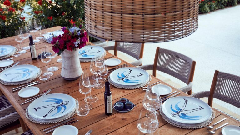 Dining table set beneath a woven pendant, Villa Maçakızı Bodrum