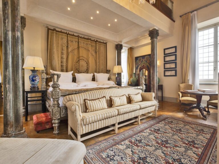 A suite bedroom with frescoed headboard wall, Villa Mangiacane