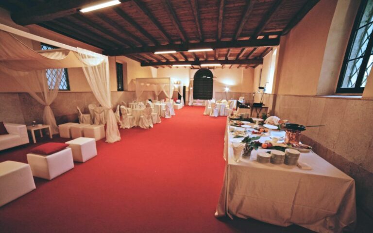 The Antica Tinaia set for a reception, Villa Mosconi Bertani