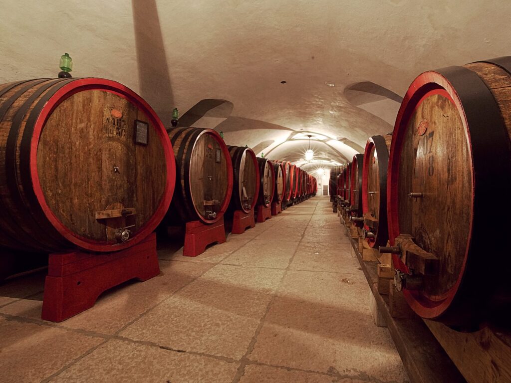 The historic wine cellar with its large oak casks, Villa Mosconi Bertani