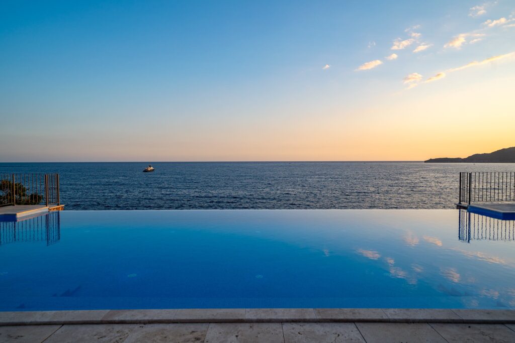 Terraces, pool and private pier
