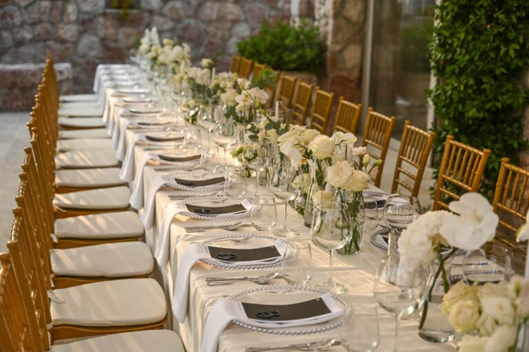 A long table laid for a wedding dinner on the terrace, Villa Ponta Melagrana