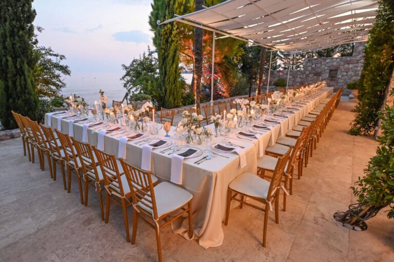 A long table set on the terrace under a canopy, Villa Ponta Melagrana