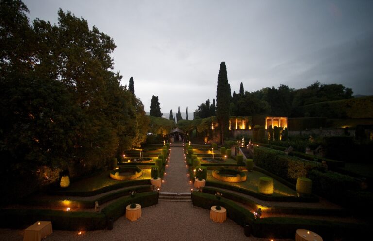 The parterre and the Viale dei Carpini lit at night, Villa Rizzardi