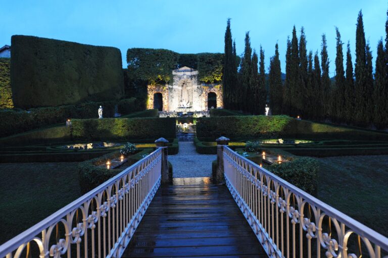 The secret garden and its bridge at dusk, Villa Rizzardi