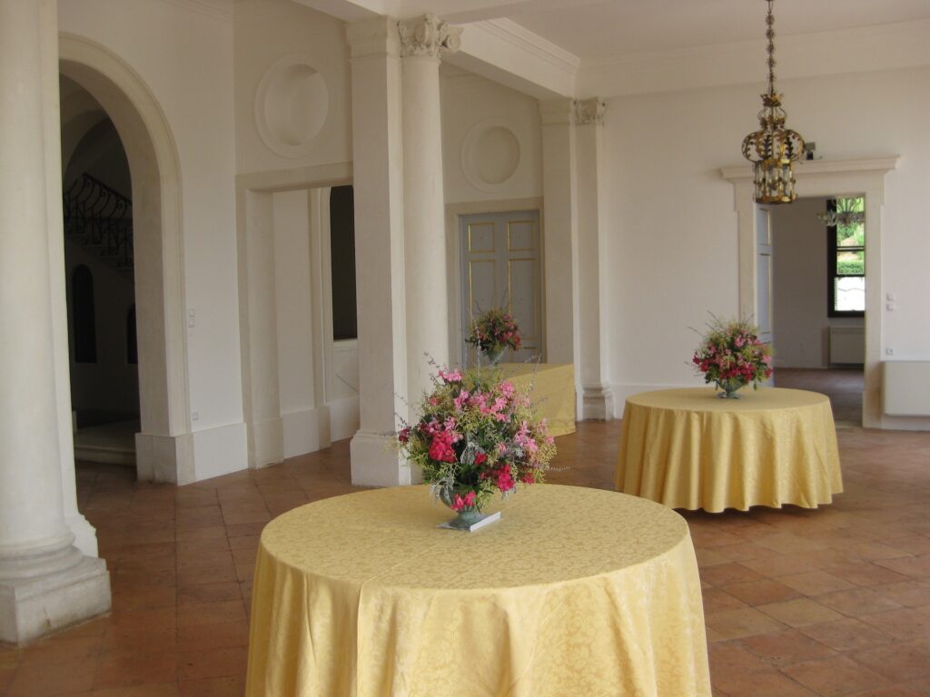 A reception room set with round tables, Villa Rizzardi