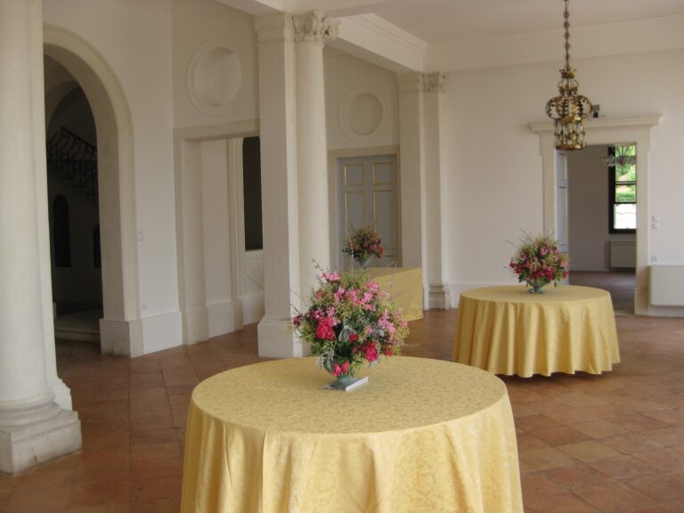 A reception room set with round tables, Villa Rizzardi