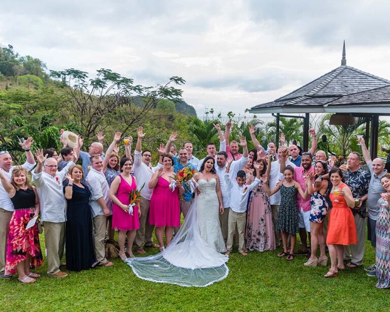 Wedding guests and the bride on the lawn in front of the gazebo, Villa Susanna St Lucia